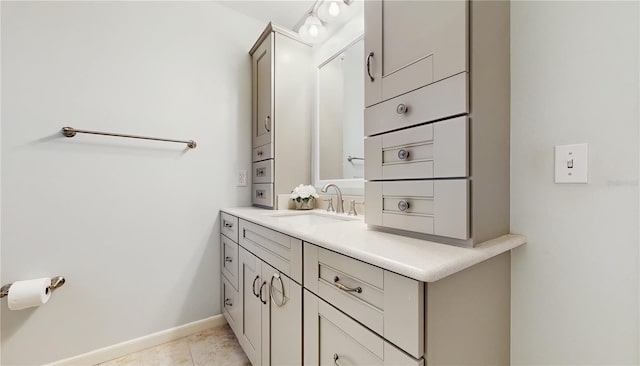 7845 Clubhouse Estates Dr, Orlando, FL 32819 - bathroom with baseboards and vanity