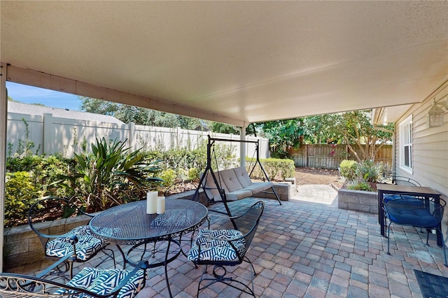 7845 Clubhouse Estates Dr, Orlando, FL 32819 - view of patio with a fenced backyard