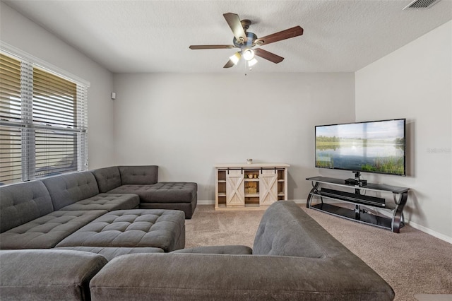 1918 Marabou Dr, Davenport, FL 33896 - living area with visible vents, baseboards, carpet flooring, and ceiling fan