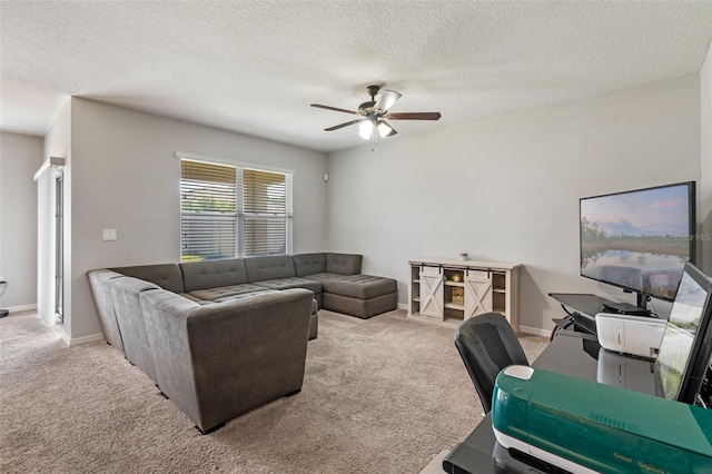 1918 Marabou Dr, Davenport, FL 33896 - living area with a textured ceiling, carpet flooring, a ceiling fan, and baseboards