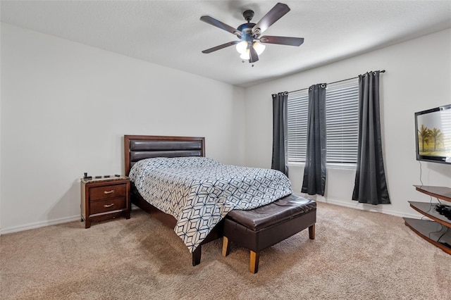 1918 Marabou Dr, Davenport, FL 33896 - bedroom featuring baseboards, a ceiling fan, and carpet