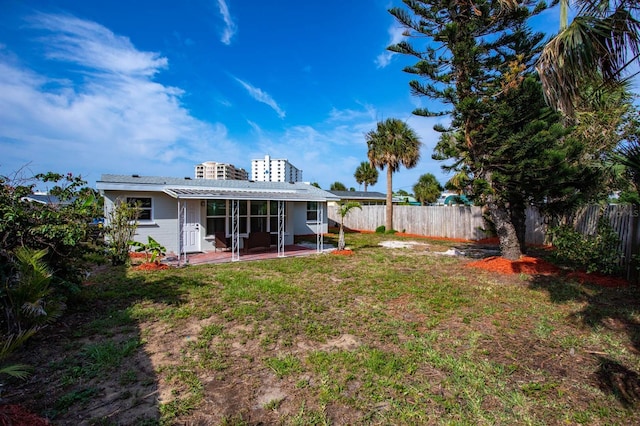 view of yard with a patio and a fenced backyard