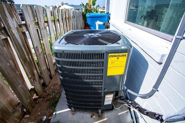 exterior details featuring fence and central air condition unit