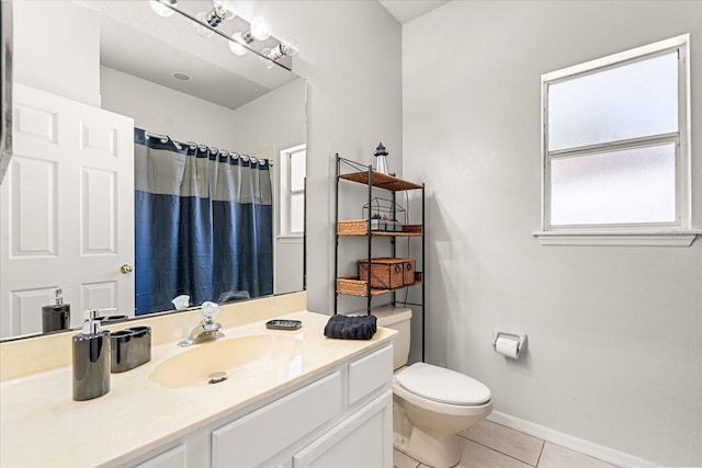 full bathroom with curtained shower, tile patterned floors, toilet, vanity, and baseboards