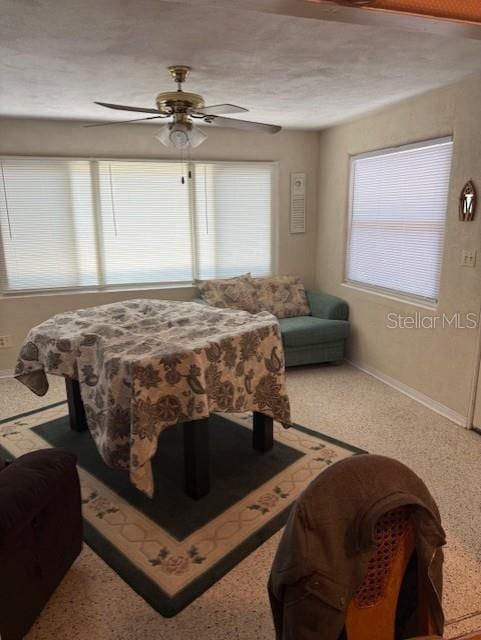 116 E Palm Way, Edgewater, FL 32132 - rec room with carpet floors, a ceiling fan, and baseboards