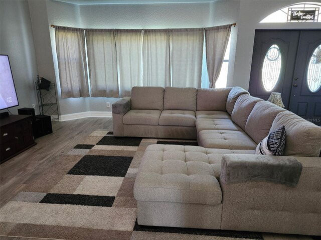 4666 Clarke St, North Port, FL 34286 - living room featuring wood finished floors and baseboards