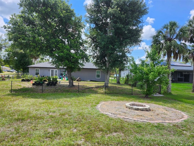 4666 Clarke St, North Port, FL 34286 - view of yard with an outdoor fire pit