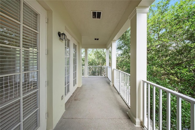 balcony featuring visible vents