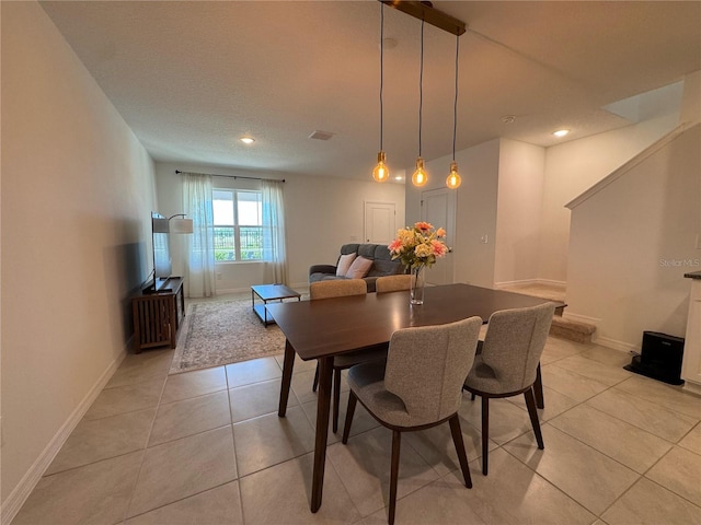 dining area featuring recessed lighting, visible vents, baseboards, and light tile patterned flooring