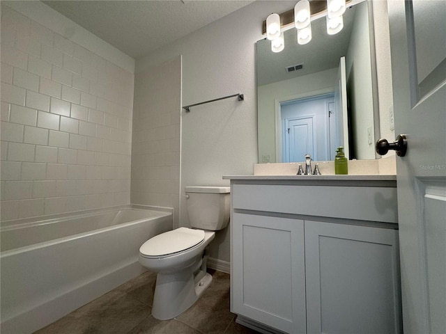 full bath featuring visible vents, toilet, shower / bath combination, vanity, and tile patterned flooring