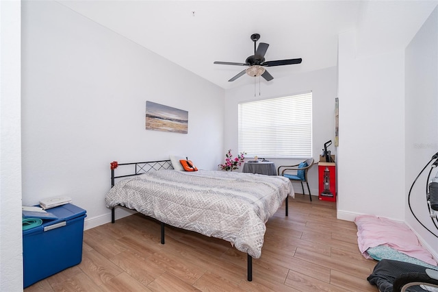 4011 Venetian Bay Dr Unit 103, Kissimmee, FL 34741 - bedroom featuring baseboards, light wood finished floors, and ceiling fan