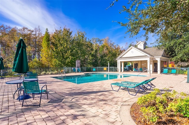 4011 Venetian Bay Dr Unit 103, Kissimmee, FL 34741 - pool featuring a patio and fence