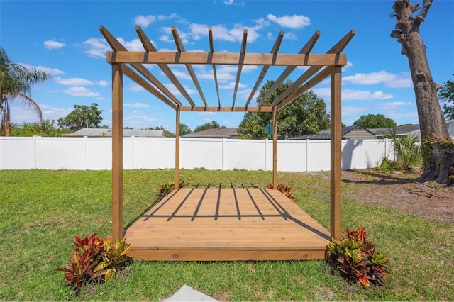 wooden terrace with a pergola, a fenced backyard, and a yard