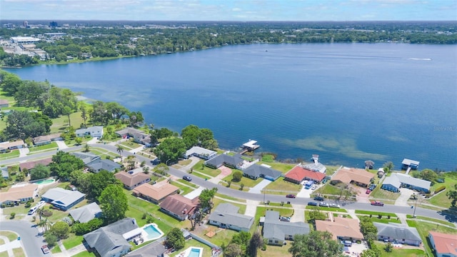 bird's eye view featuring a residential view and a water view