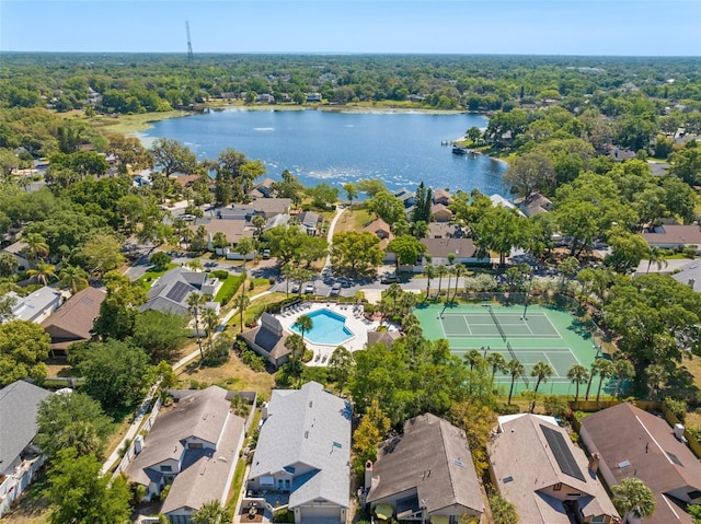 birds eye view of property with a residential view and a water view