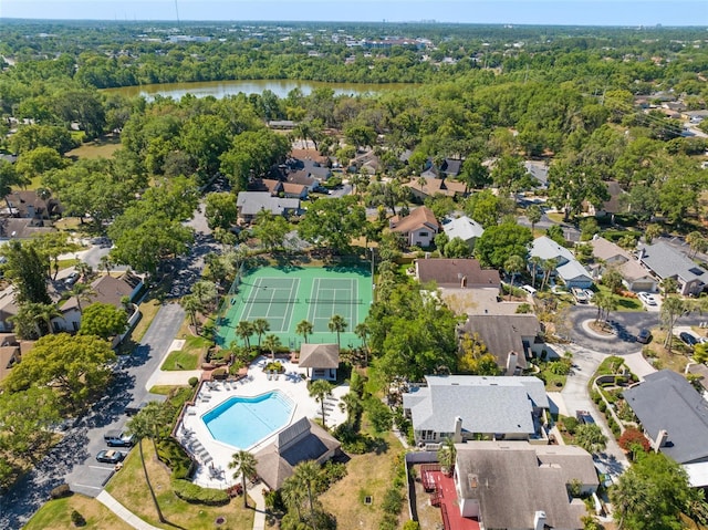 drone / aerial view with a residential view and a water view