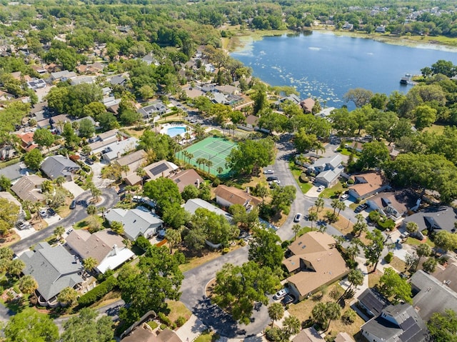 birds eye view of property with a residential view and a water view