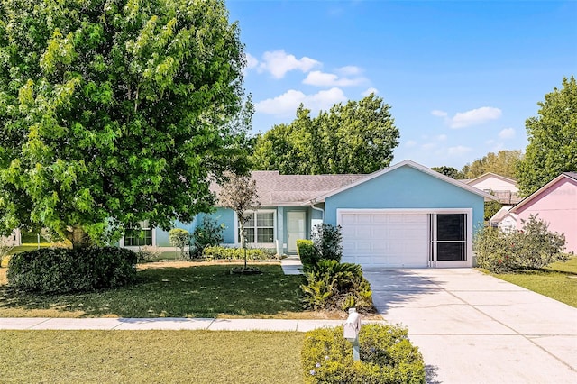 single story home featuring a garage, stucco siding, driveway, and a front yard