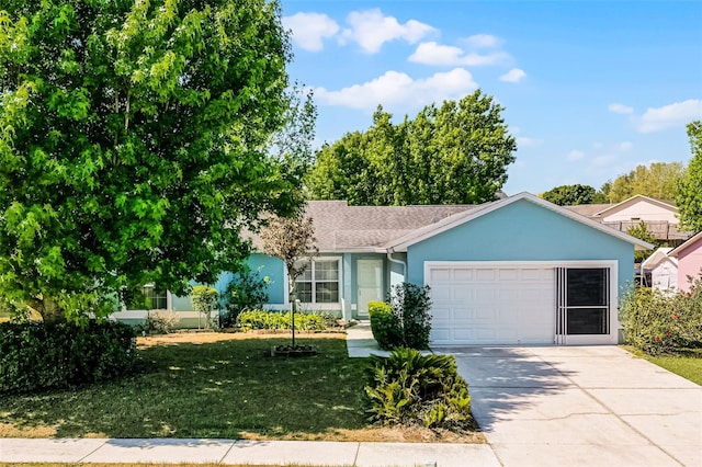ranch-style house featuring driveway, a front yard, a garage, a shingled roof, and stucco siding