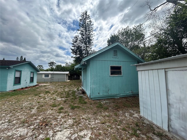 exterior space featuring an outbuilding