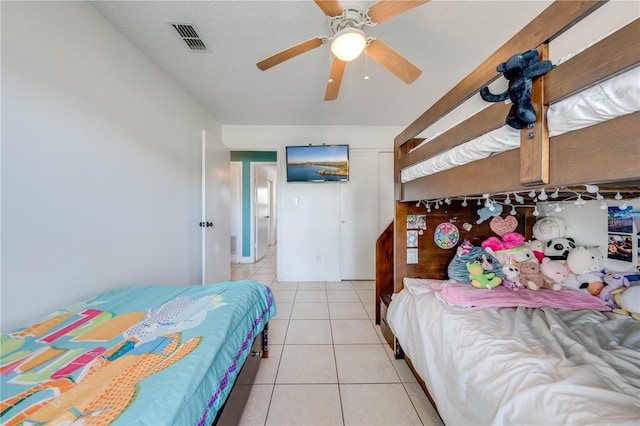 194 Larkspur Ct, Kissimmee, FL 34743 - bedroom featuring visible vents, a ceiling fan, and light tile patterned floors