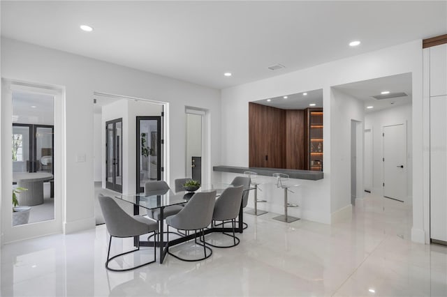 10849 Emerald Chase Dr, Orlando, FL 32836 - dining area featuring recessed lighting and light tile patterned floors