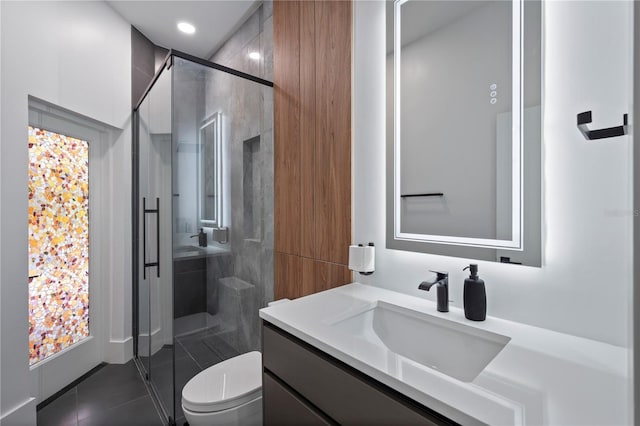 10849 Emerald Chase Dr, Orlando, FL 32836 - full bathroom featuring vanity, a stall shower, tile patterned flooring, and recessed lighting