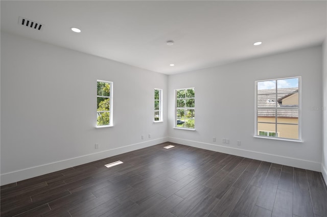 10849 Emerald Chase Dr, Orlando, FL 32836 - unfurnished room featuring recessed lighting and dark wood finished floors