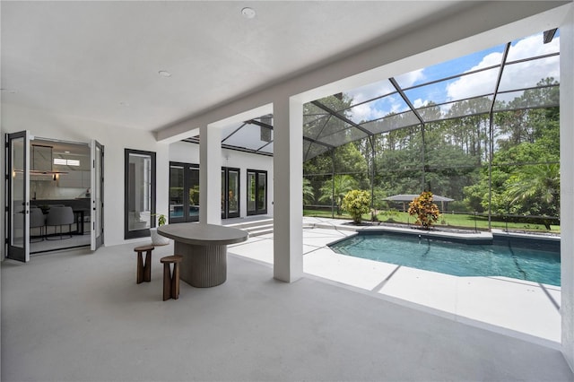 10849 Emerald Chase Dr, Orlando, FL 32836 - swimming pool with a patio area and glass enclosure
