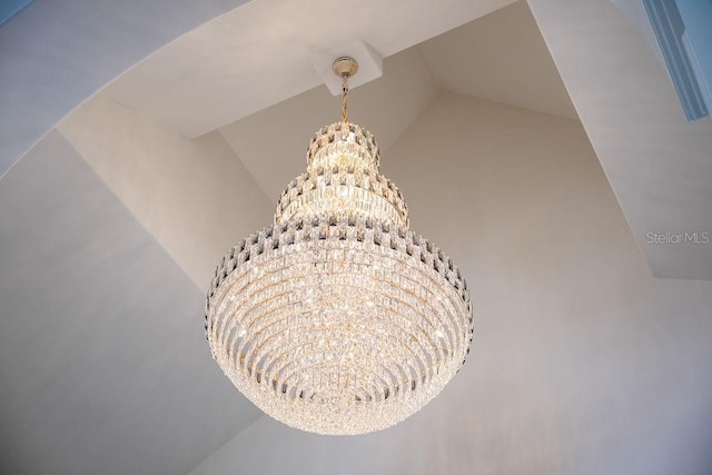 570 Manor Rd, Maitland, FL 32751 - interior details featuring an inviting chandelier