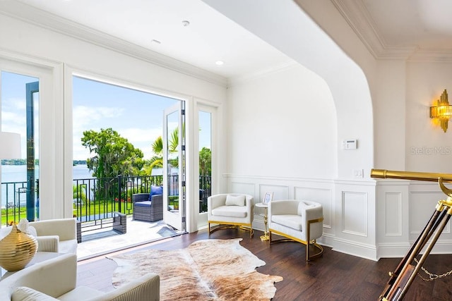 570 Manor Rd, Maitland, FL 32751 - interior space featuring a water view, a healthy amount of sunlight, dark wood-style flooring, and wainscoting