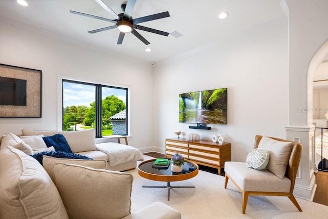 570 Manor Rd, Maitland, FL 32751 - living room with arched walkways, a ceiling fan, and recessed lighting