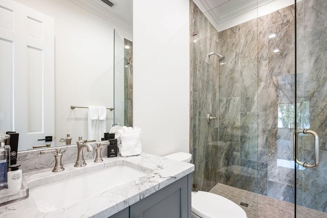 570 Manor Rd, Maitland, FL 32751 - full bathroom featuring vanity, a shower stall, ornamental molding, and toilet