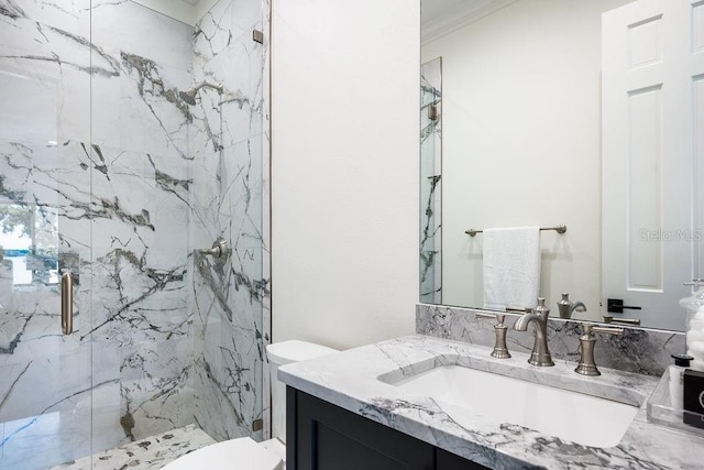 570 Manor Rd, Maitland, FL 32751 - full bath with ornamental molding, toilet, vanity, and a marble finish shower