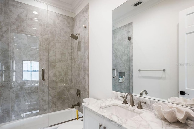 570 Manor Rd, Maitland, FL 32751 - full bathroom with enclosed tub / shower combo, ornamental molding, vanity, and visible vents