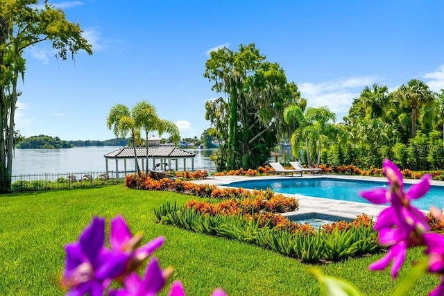570 Manor Rd, Maitland, FL 32751 - view of swimming pool with a gazebo, a lawn, a water view, fence, and a fenced in pool