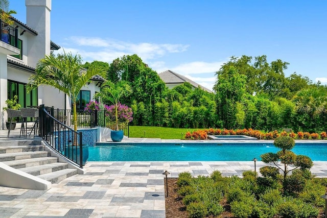 570 Manor Rd, Maitland, FL 32751 - outdoor pool featuring a patio area and a hot tub