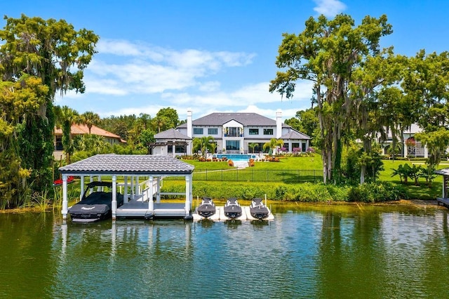 570 Manor Rd, Maitland, FL 32751 - dock area featuring a yard, a water view, boat lift, and fence