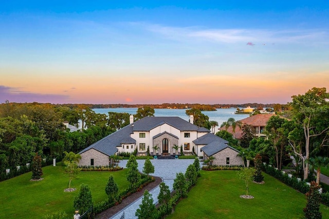 570 Manor Rd, Maitland, FL 32751 - drone / aerial view with a water view