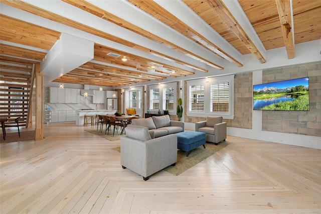 living room featuring beam ceiling