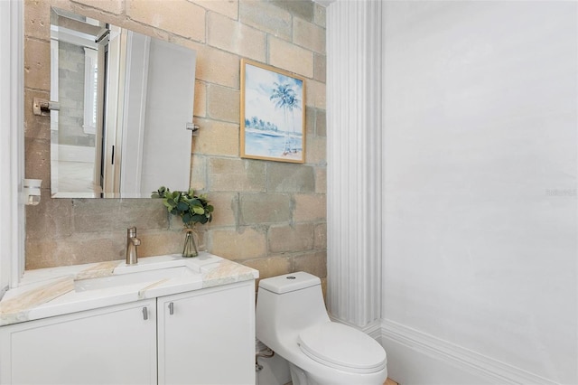 half bath with toilet and vanity