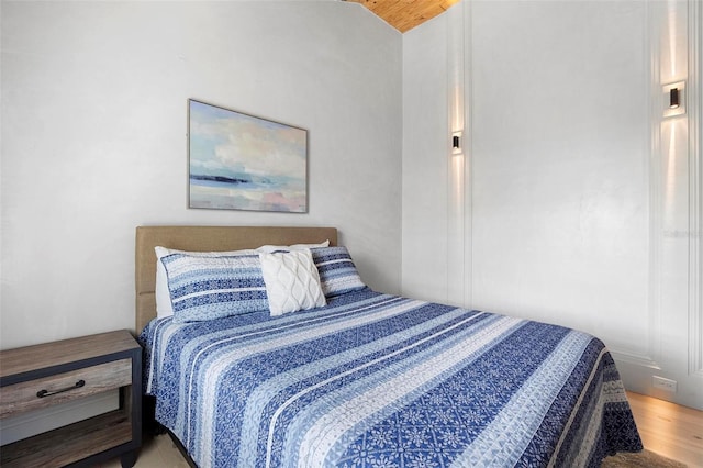 bedroom featuring wood finished floors