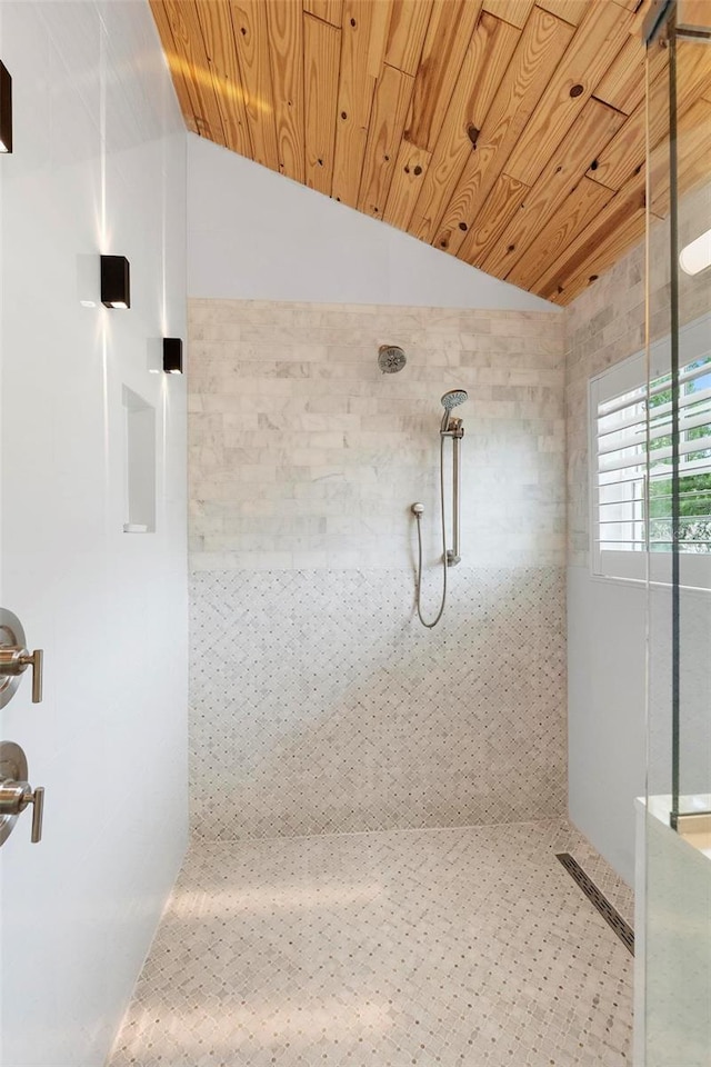 full bath featuring lofted ceiling, a walk in shower, and wooden ceiling