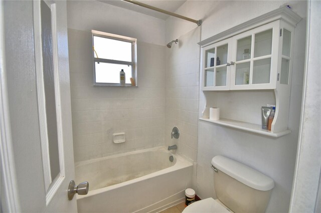 full bathroom with toilet and shower / bathtub combination