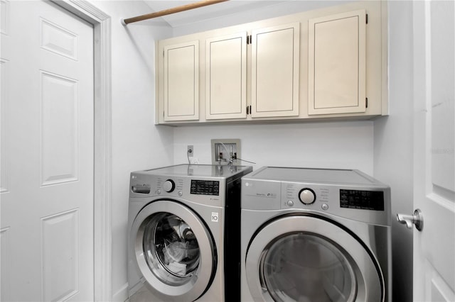 4833 Palm Tree Ct, Windermere, FL 34786 - laundry area featuring washing machine and clothes dryer and cabinet space