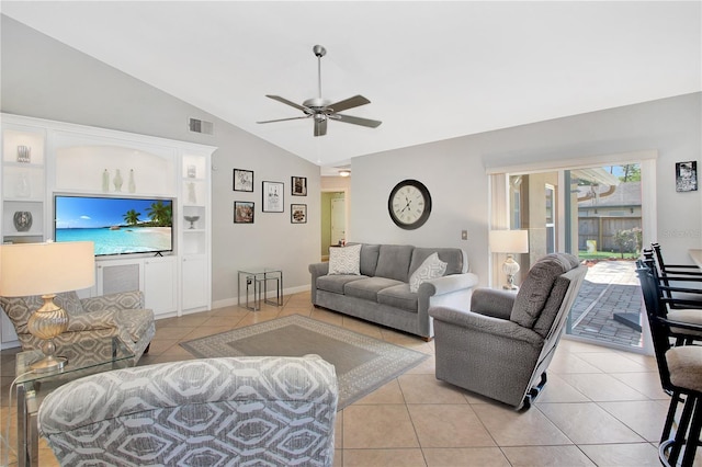 4833 Palm Tree Ct, Windermere, FL 34786 - living room with light tile patterned floors, ceiling fan, built in shelves, high vaulted ceiling, and baseboards