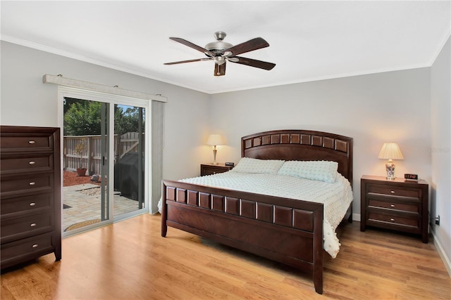 4833 Palm Tree Ct, Windermere, FL 34786 - bedroom featuring access to exterior, crown molding, light wood finished floors, ceiling fan, and baseboards