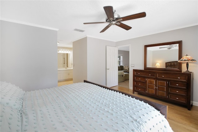 4833 Palm Tree Ct, Windermere, FL 34786 - bedroom with crown molding, wood finished floors, ensuite bathroom, a ceiling fan, and baseboards