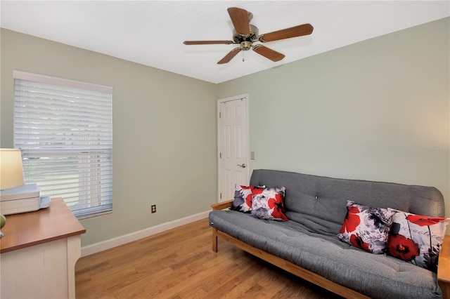 4833 Palm Tree Ct, Windermere, FL 34786 - living area featuring light wood-style flooring, baseboards, and ceiling fan