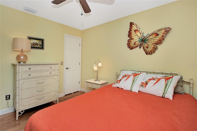 4833 Palm Tree Ct, Windermere, FL 34786 - bedroom featuring wood finished floors, baseboards, and ceiling fan